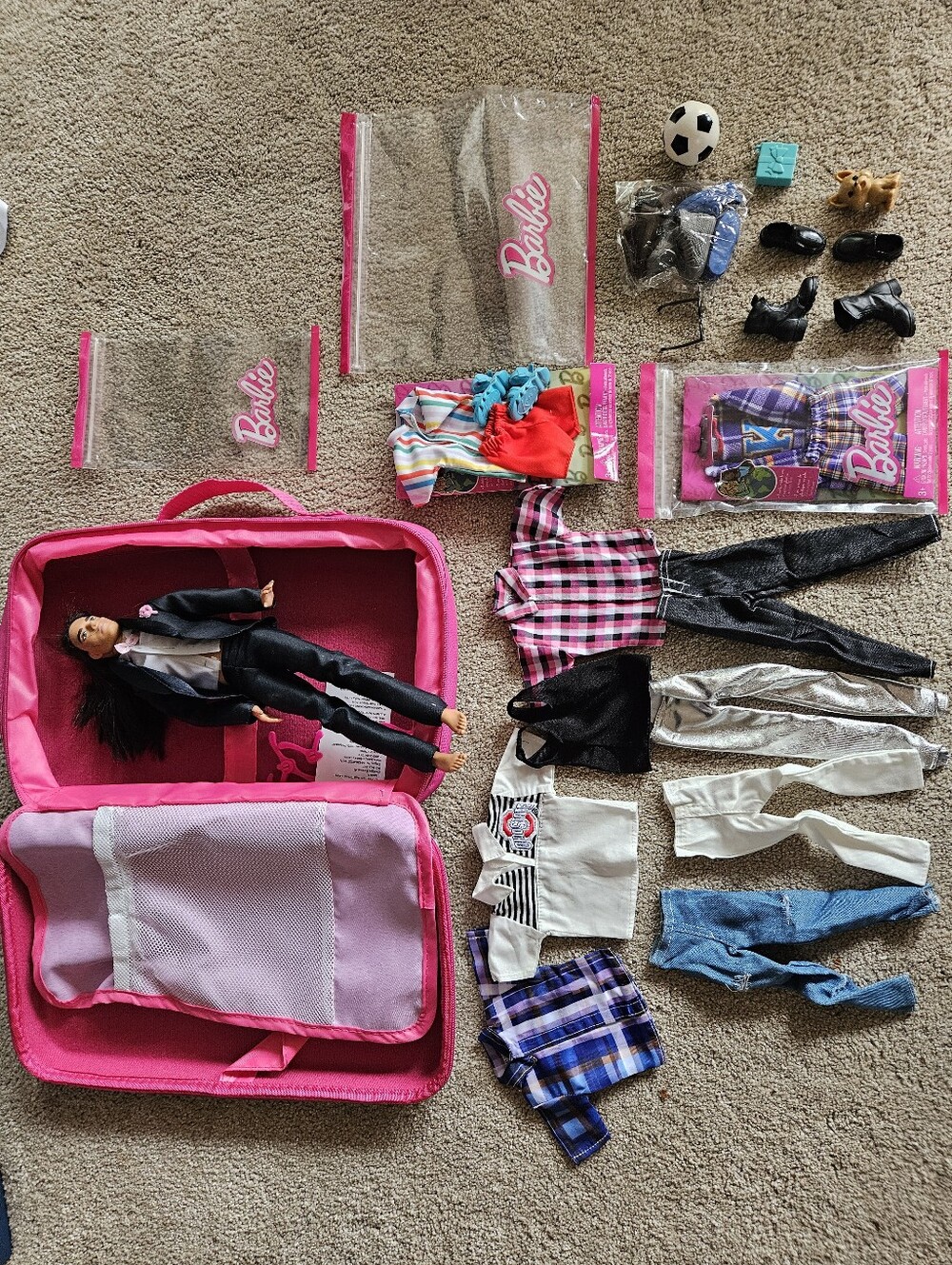 New and like new Ken Doll with accessories